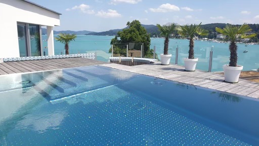 Luxus Ferienwohnungen am Wörthersee mit Rooftop Pool inkl. Gegenstromanlage